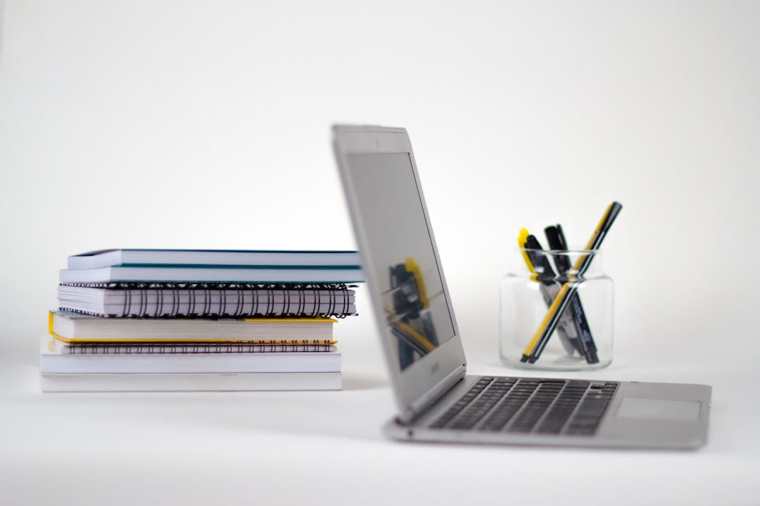 macbook pro on white table on Skill Forge